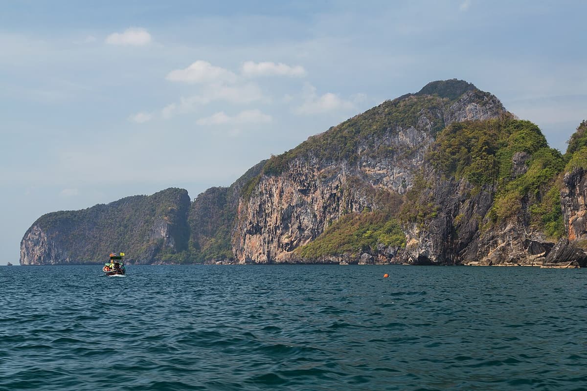 The limestone cliffs of Koh Muk rising straight out of the sea